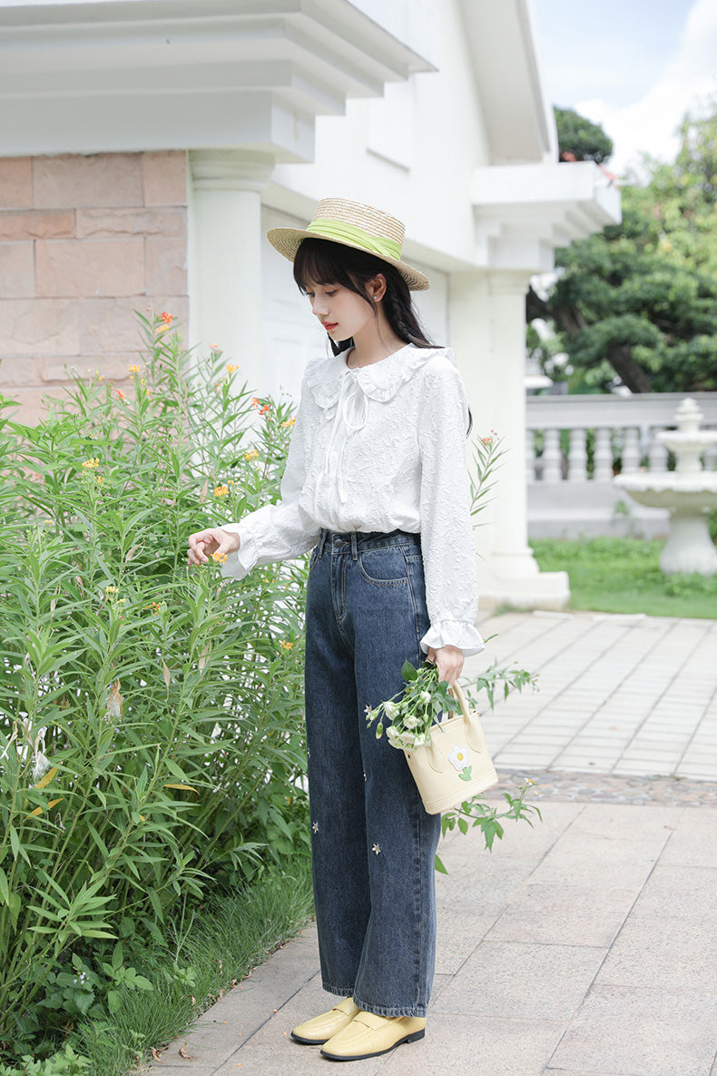 Jeans mit Gänseblümchen-Stickerei