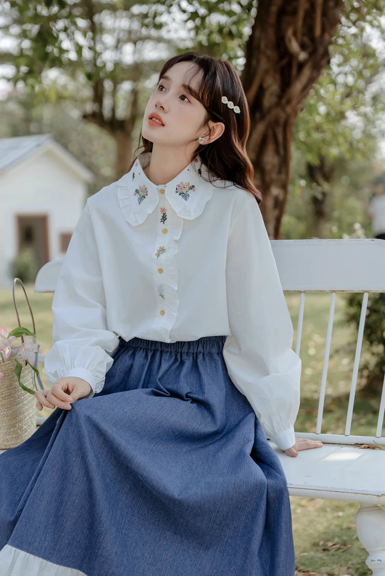 Blusa bordada con ramo floral