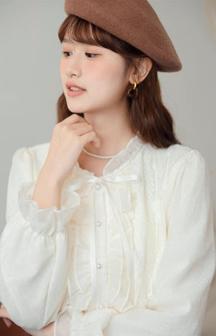 Ruffle Trim Tie Neck Blouse