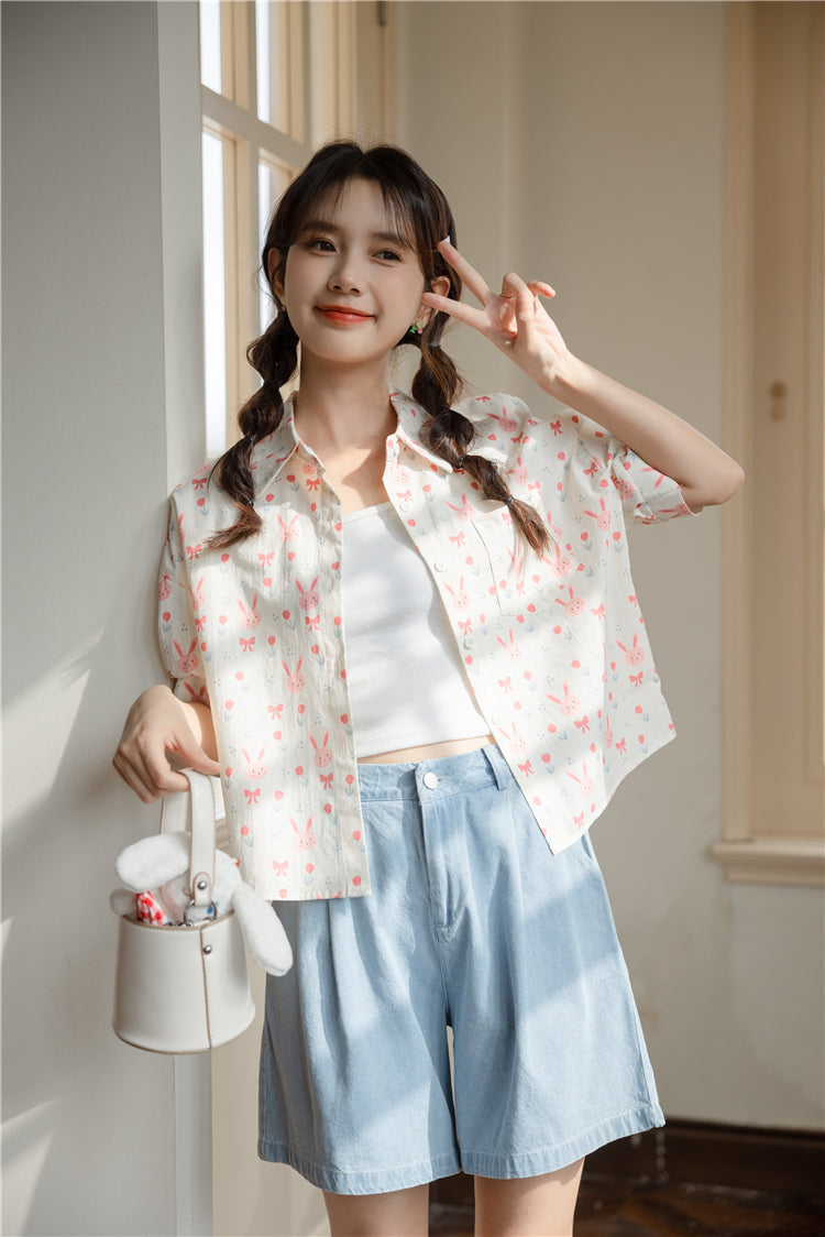Camisa corta con botones de conejito rosa