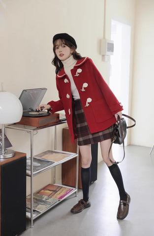 Abrigo tipo trenca con cuello Peter Pan y botones