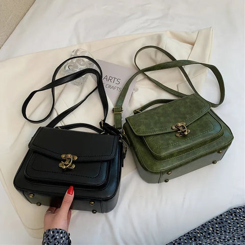 Signature Swivel Satchel Bag
