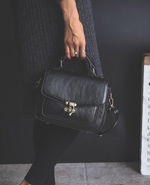 Signature Swivel Satchel Bag