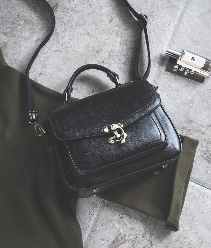 Signature Swivel Satchel Bag