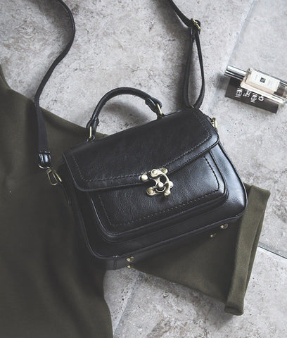 Signature Swivel Satchel Bag