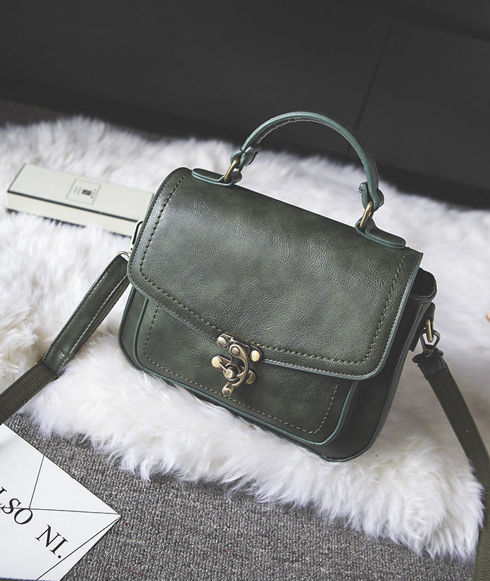 Signature Swivel Satchel Bag