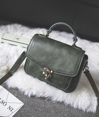 Signature Swivel Satchel Bag