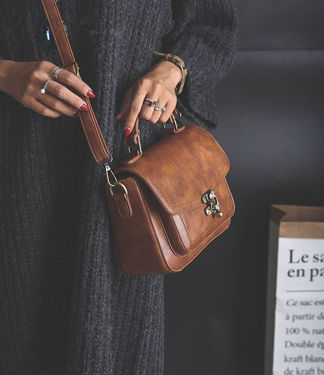 Signature Swivel Satchel Bag