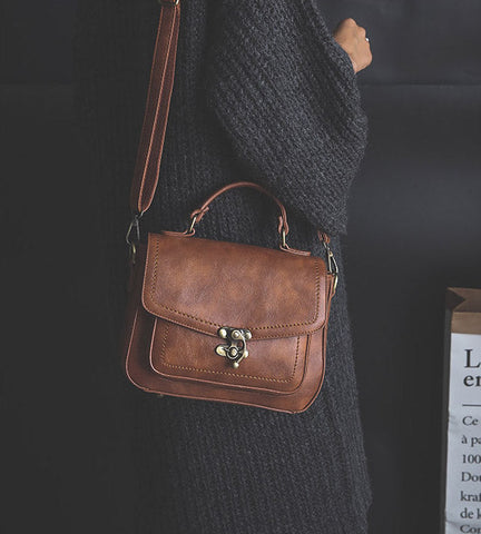 Signature Swivel Satchel Bag