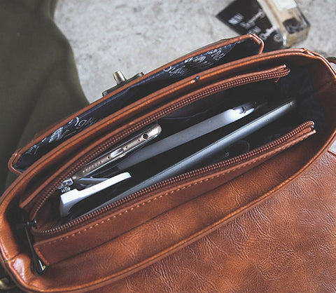 Signature Swivel Satchel Bag