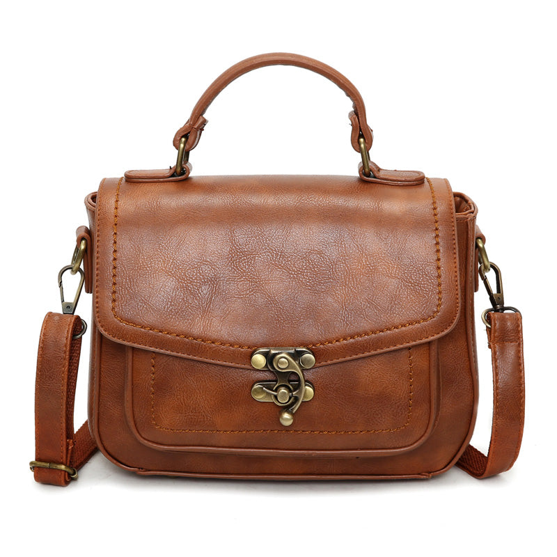 Signature Swivel Satchel Bag