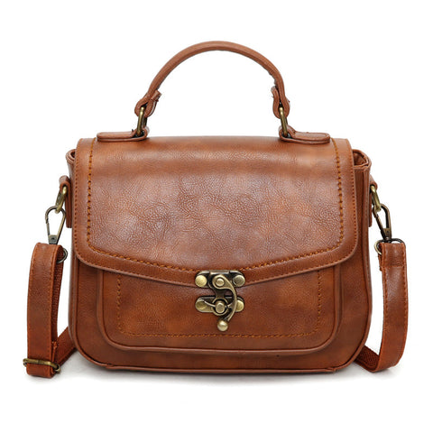 Signature Swivel Satchel Bag