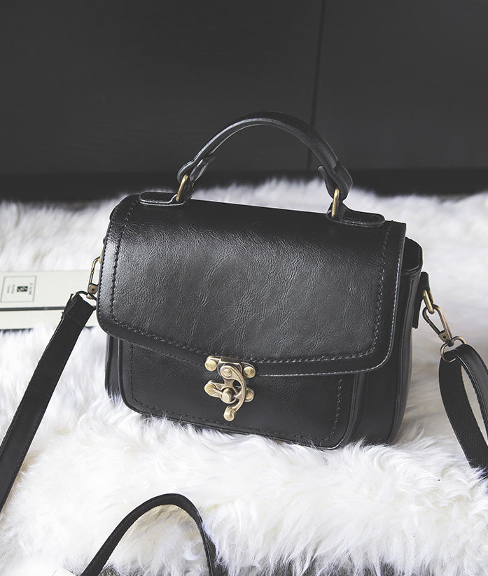 Signature Swivel Satchel Bag