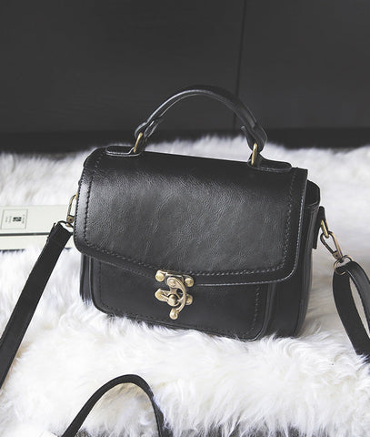 Signature Swivel Satchel Bag
