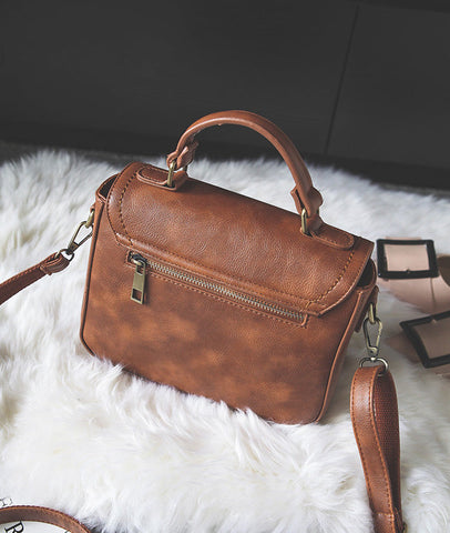 Signature Swivel Satchel Bag