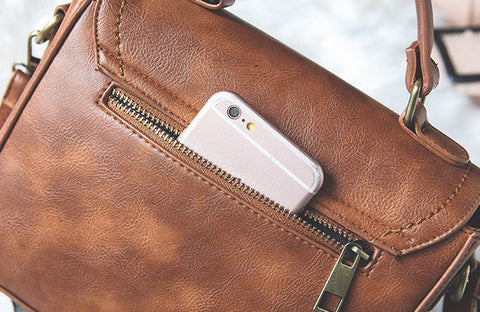 Signature Swivel Satchel Bag
