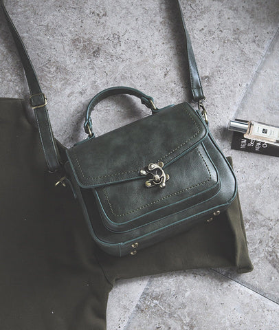Signature Swivel Satchel Bag