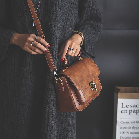 Signature Swivel Satchel Bag