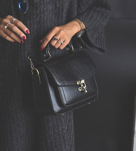 Signature Swivel Satchel Bag