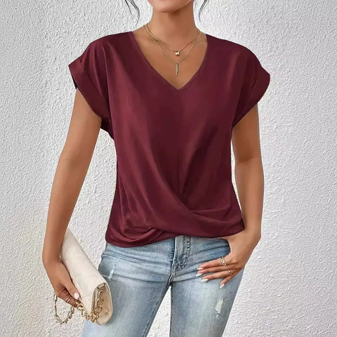 Top holgado con cuello en V y giro