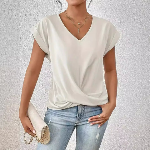 Top holgado con cuello en V y giro