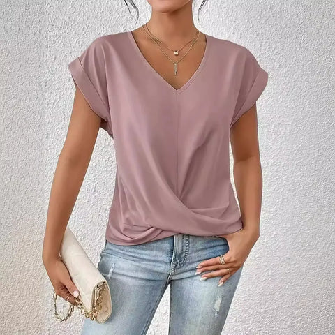 Top holgado con cuello en V y giro