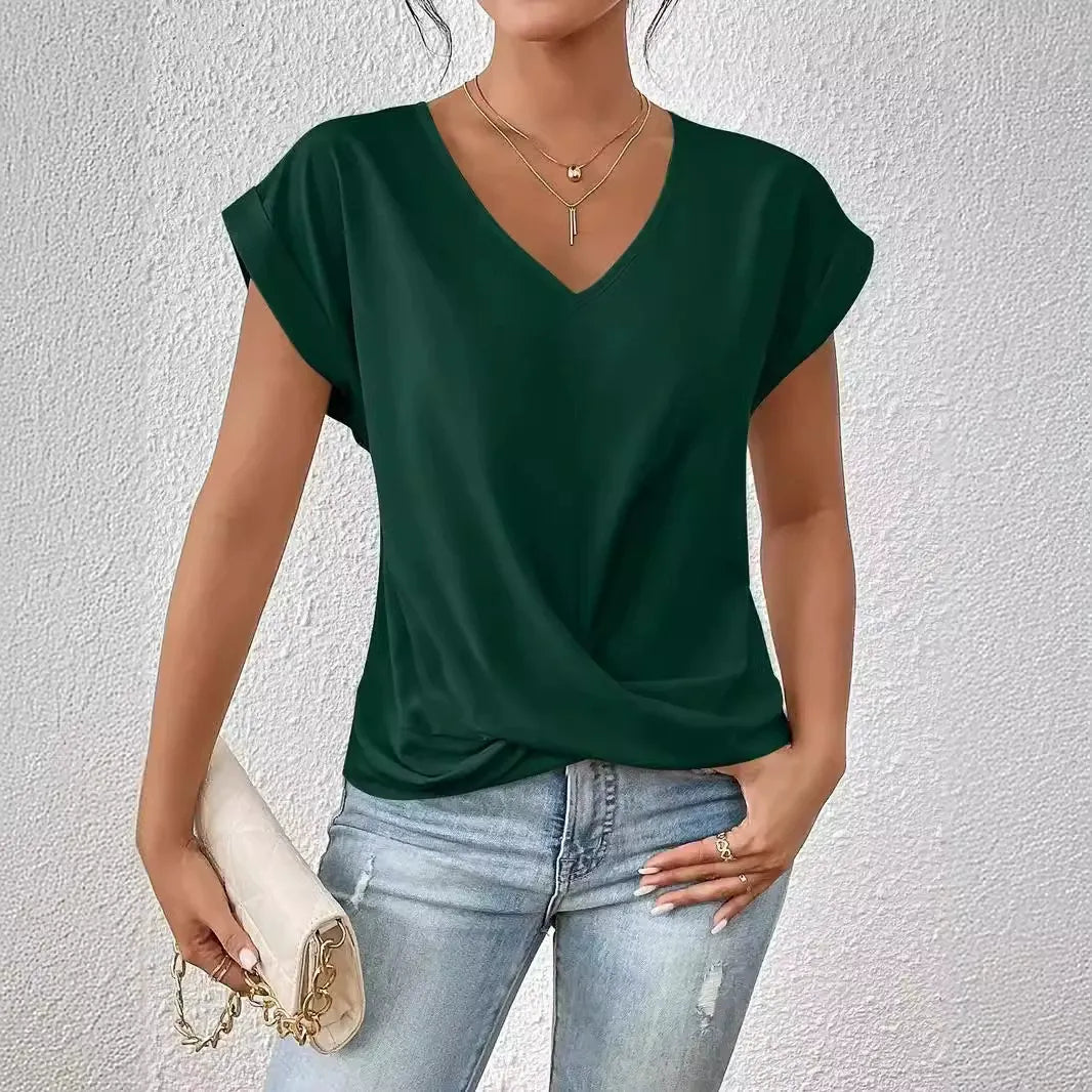 Top holgado con cuello en V y giro