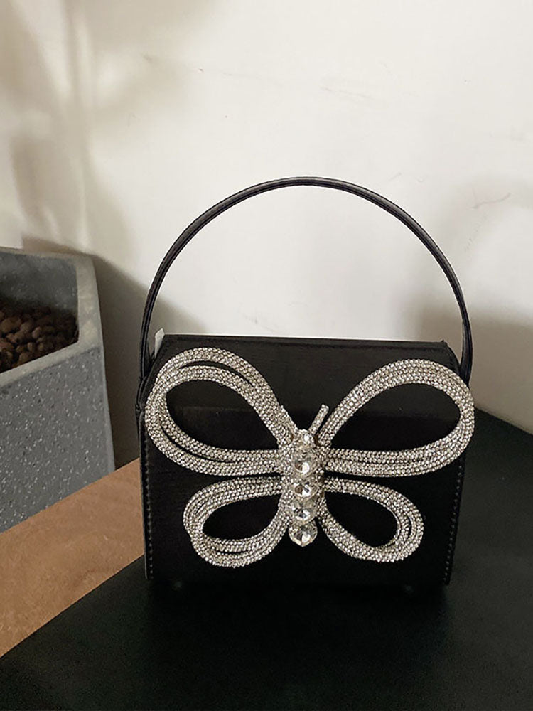 Clutch de mariposa con diamantes de imitación