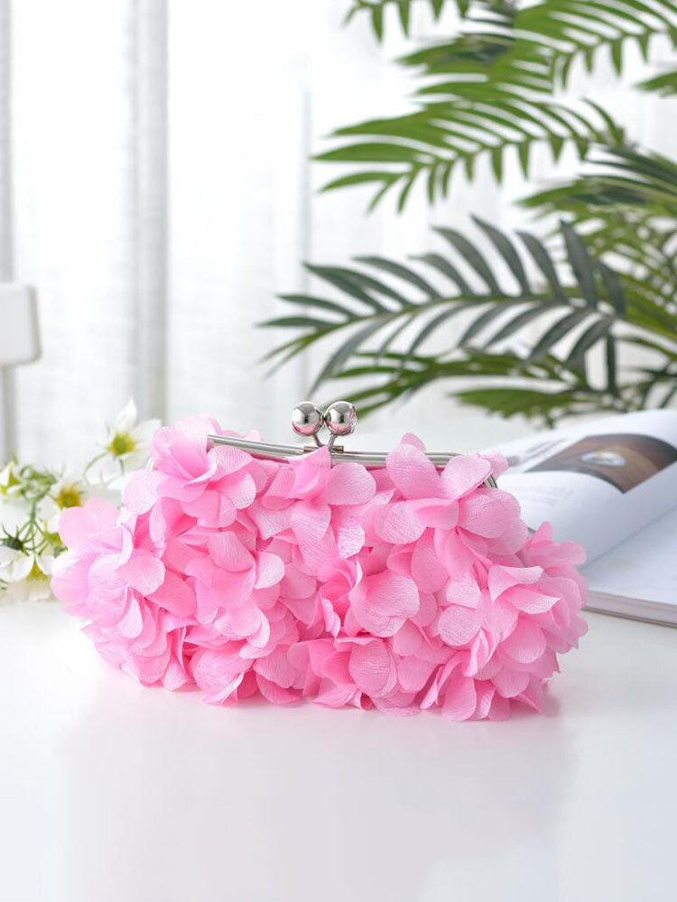 Clutch mit Blumendekor und Kisslock-Verschluss