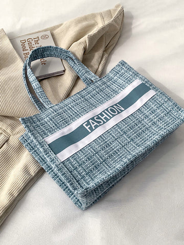 Bolso de hombro con gráfico de letras a rayas