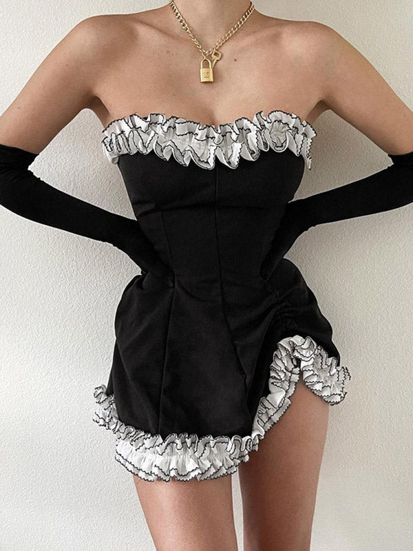 Vestido mini negro sin tirantes con detalle de guantes