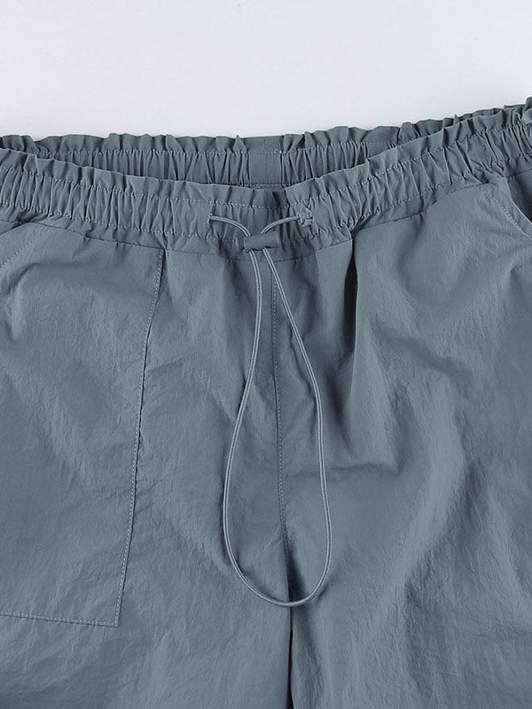 Pantalones cargo de paracaídas con cordón y bolsillo de tamaño accesible