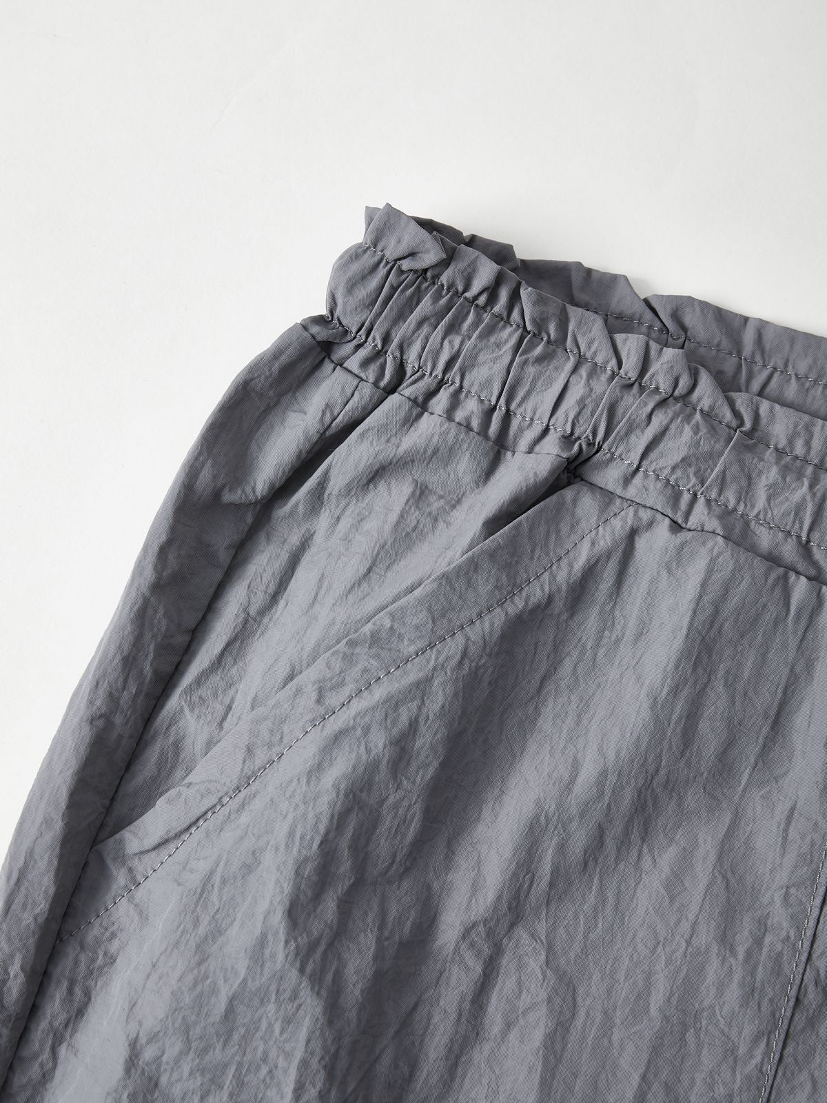 Pantalones cargo de paracaídas con cordón y bolsillo de tamaño accesible