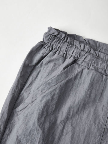 Pantalones cargo de paracaídas con cordón y bolsillo de tamaño accesible