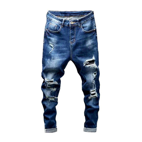 Destroyed blue jeans for men