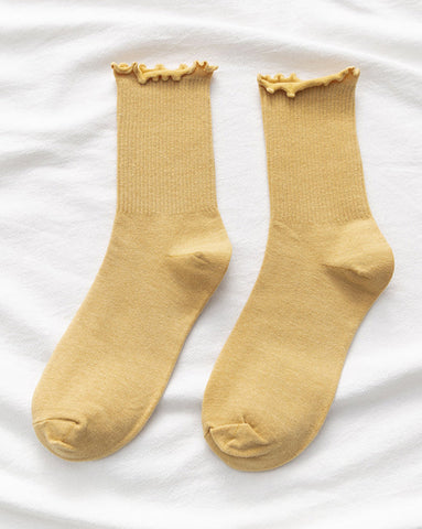 Socken mit Rüschenfalten