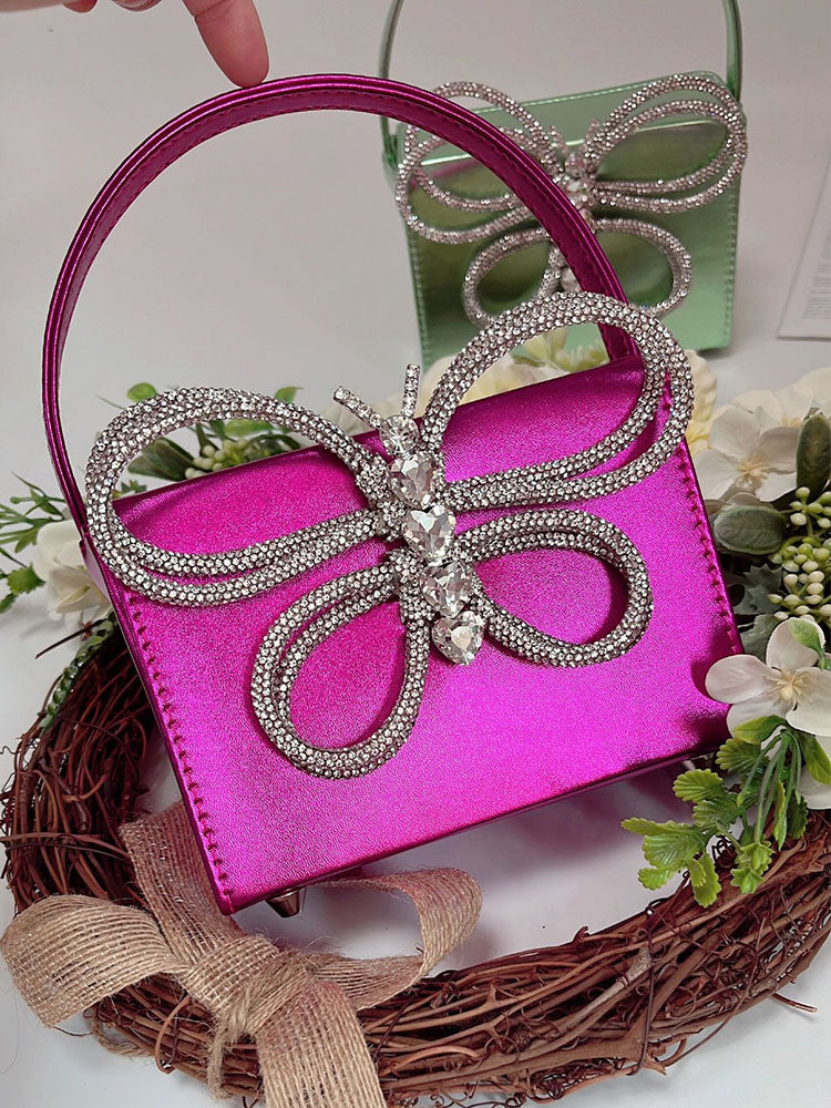 Clutch de mariposa con diamantes de imitación