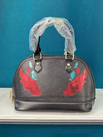 Bolso con decoración de lentejuelas