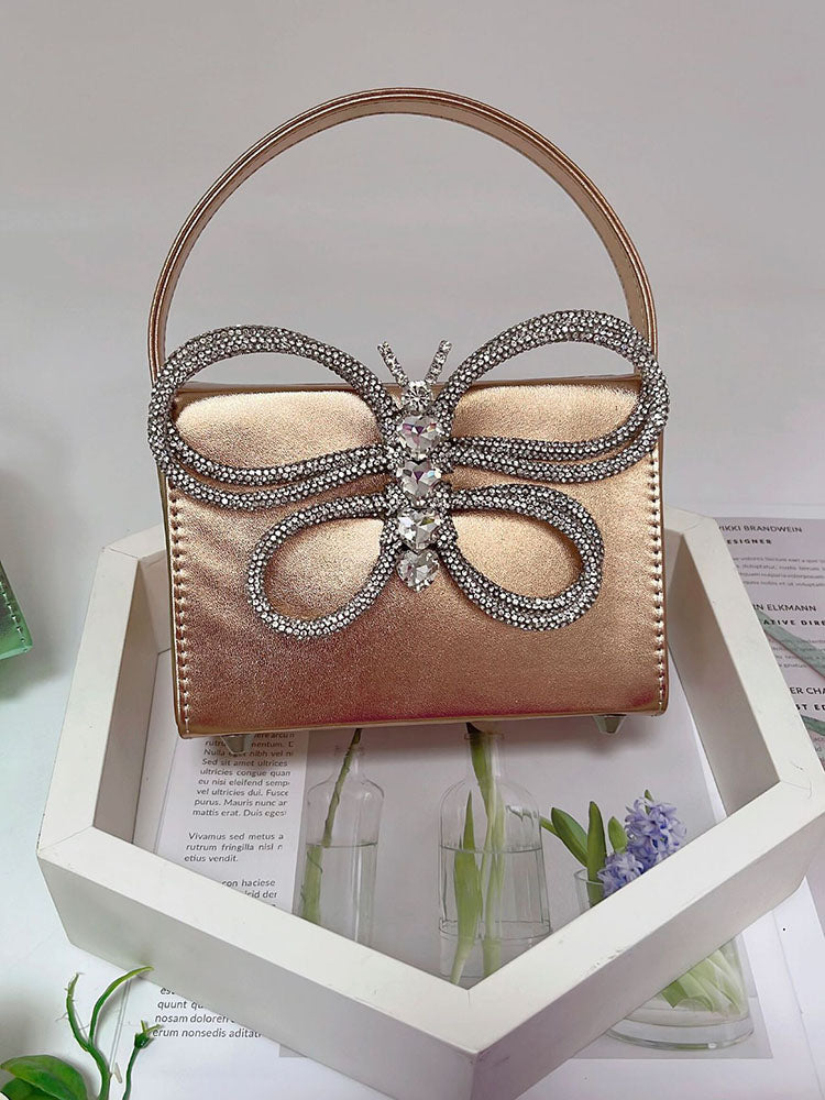 Clutch de mariposa con diamantes de imitación