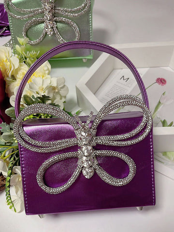 Clutch de mariposa con diamantes de imitación