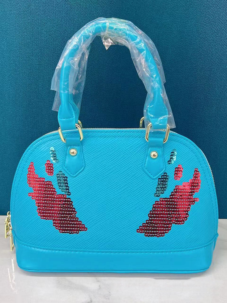 Bolso con decoración de lentejuelas