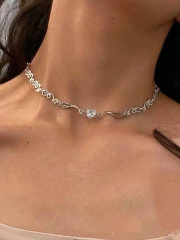 Collar de corazón con diamantes de imitación y alas de ángel