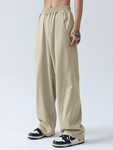 Pantalones casuales holgados con paneles para hombre