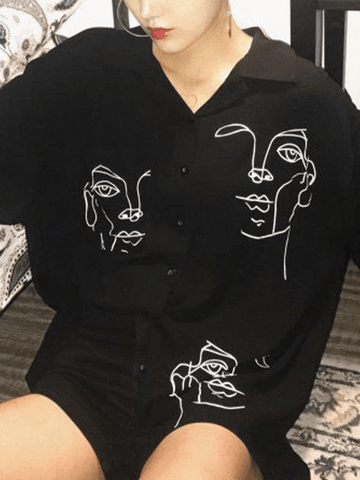 Blusa de manga larga con estampado de rostro abstracto