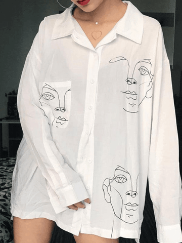 Blusa de manga larga con estampado de rostro abstracto