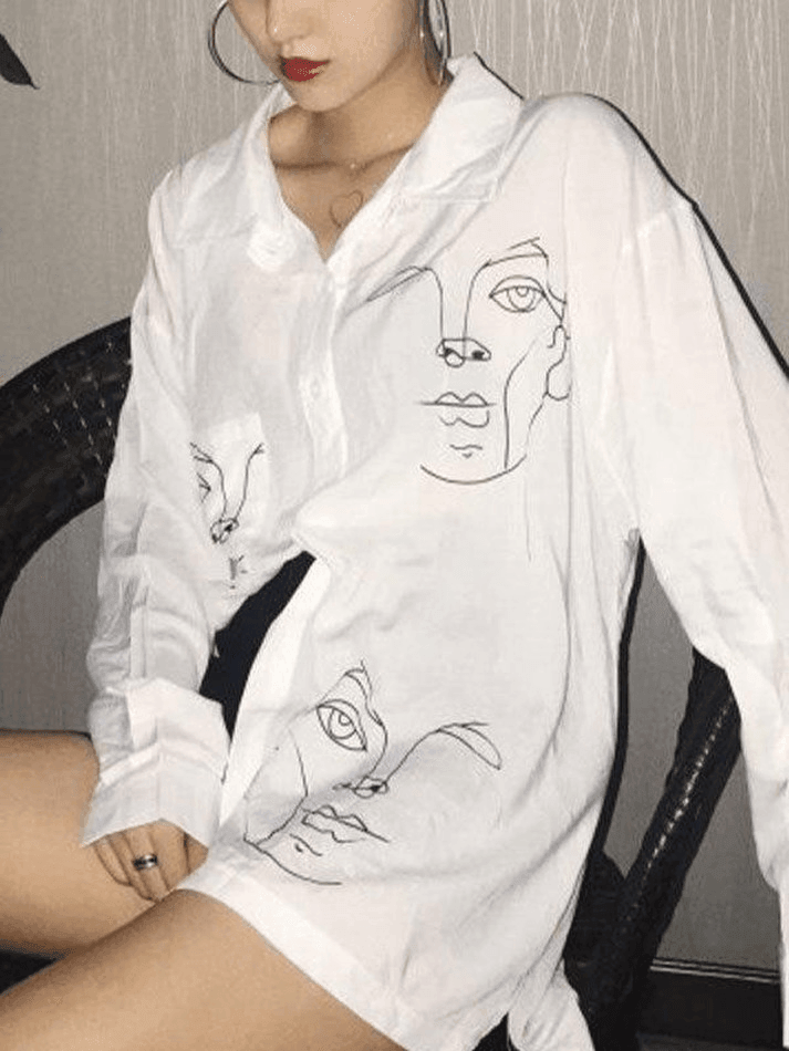 Blusa de manga larga con estampado de rostro abstracto