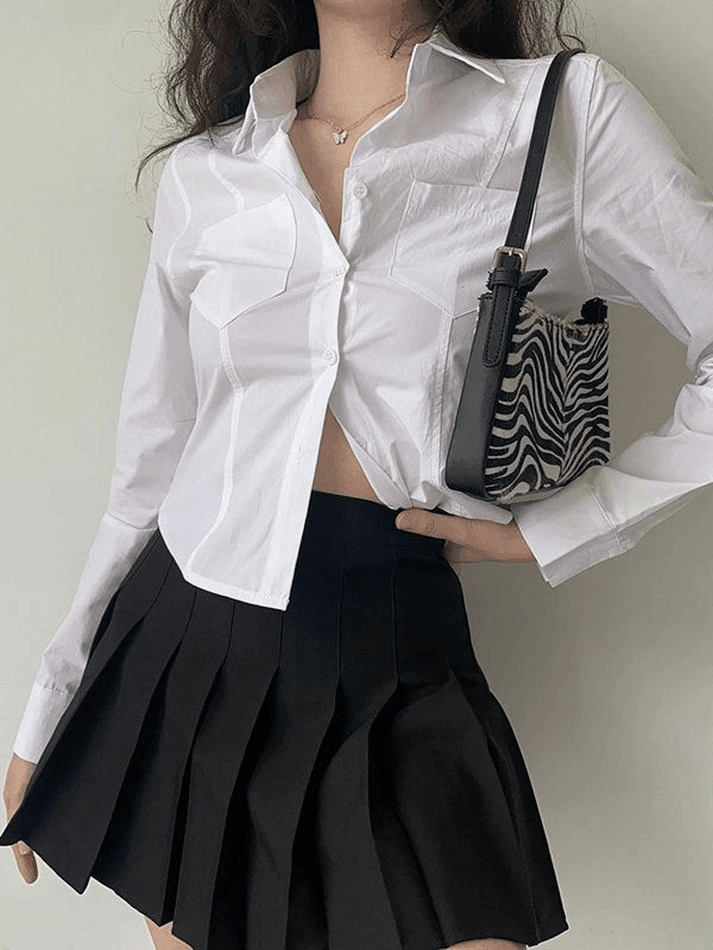 Blusa básica de manga larga con botones