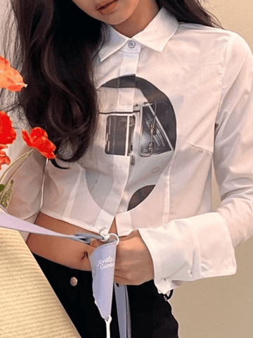 Blusa corta de manga larga con botones al frente