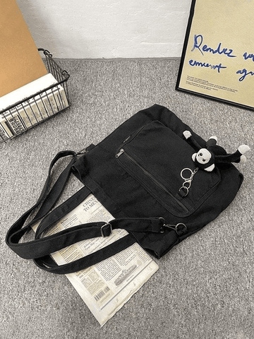 Vintage-Umhängetasche mit Cartoon-Anhänger