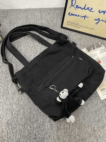 Vintage-Umhängetasche mit Cartoon-Anhänger